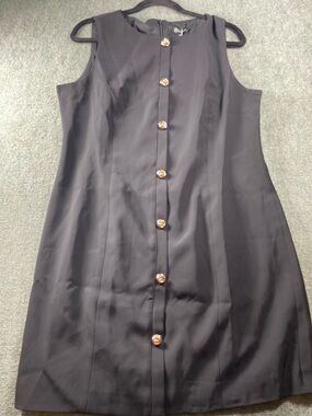 Sleeveless Black Mini Dress with Decorative Buttons